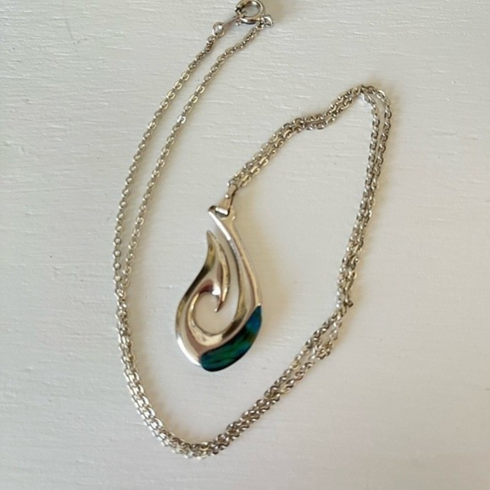 Silver necklace with a hook pendant